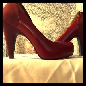 Red platform pumps size 9